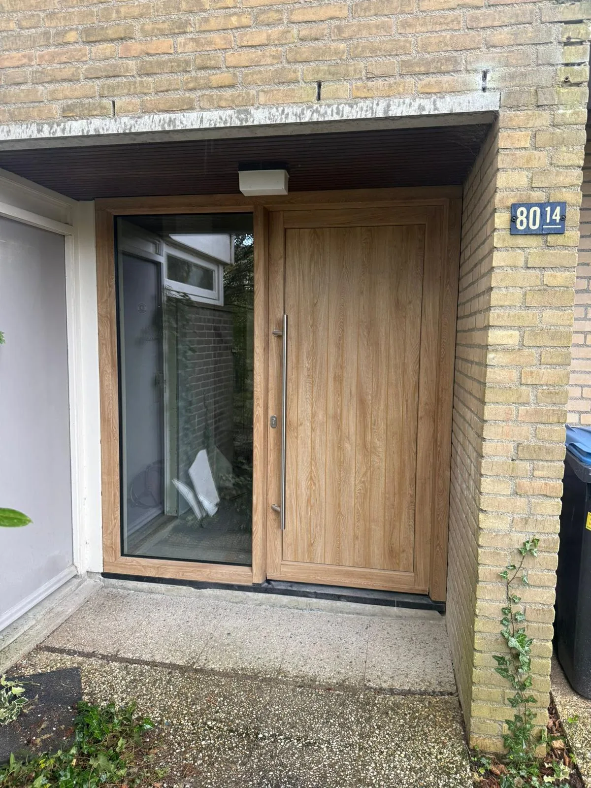 Eikenhouten voordeur met zijlicht
